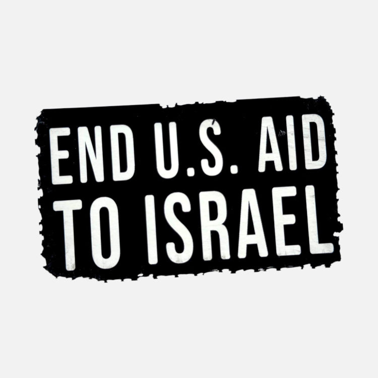 A rectangular black sticker or patch with a distressed, torn-edge border and bold white text reading 'END U.S.