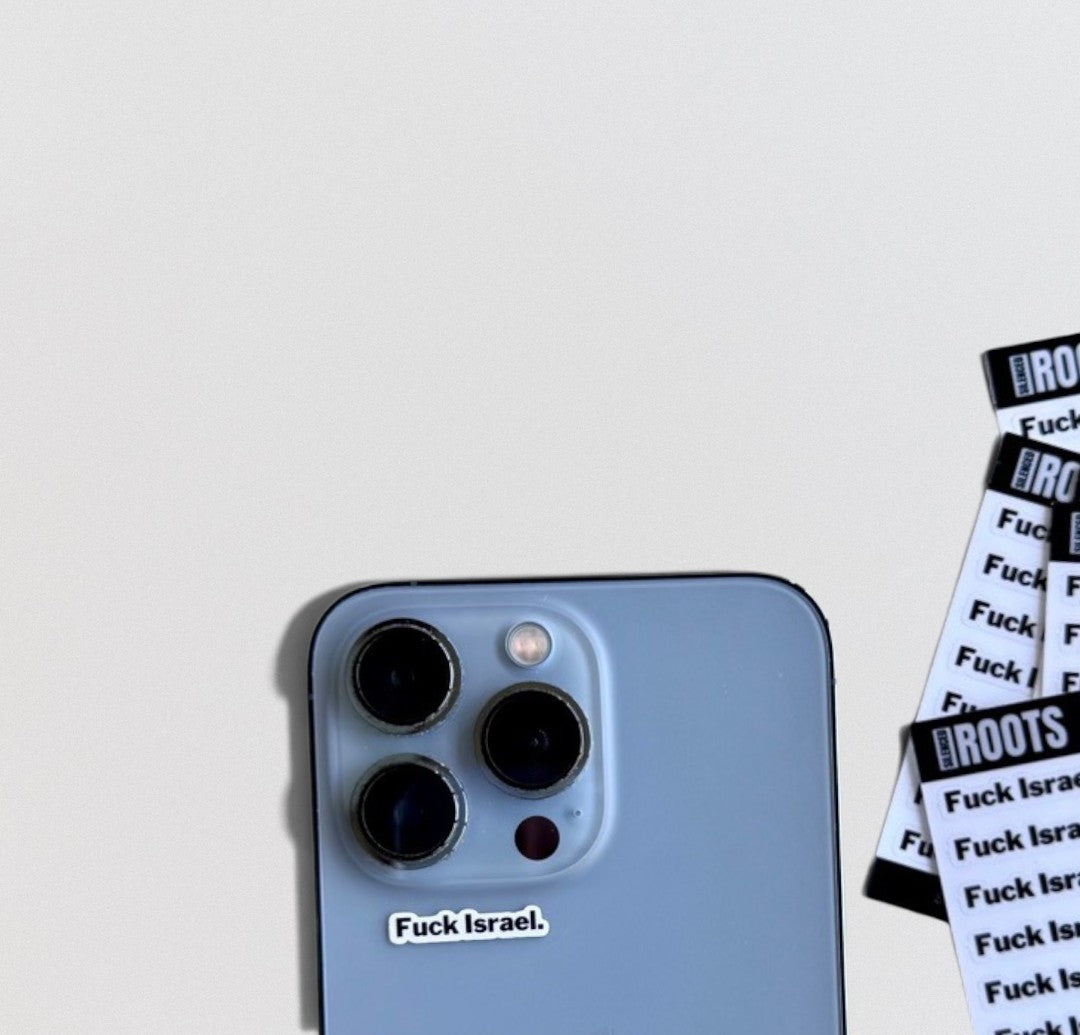 A light blue smartphone shown from the back with a small white sticker reading 'Fuck Israel.' near the bottom.