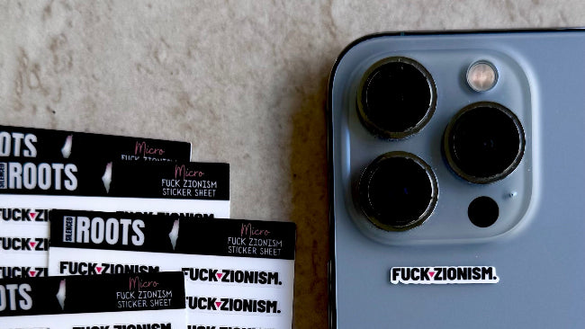 Micro 'FUCK ZIONISM' sticker on a phone