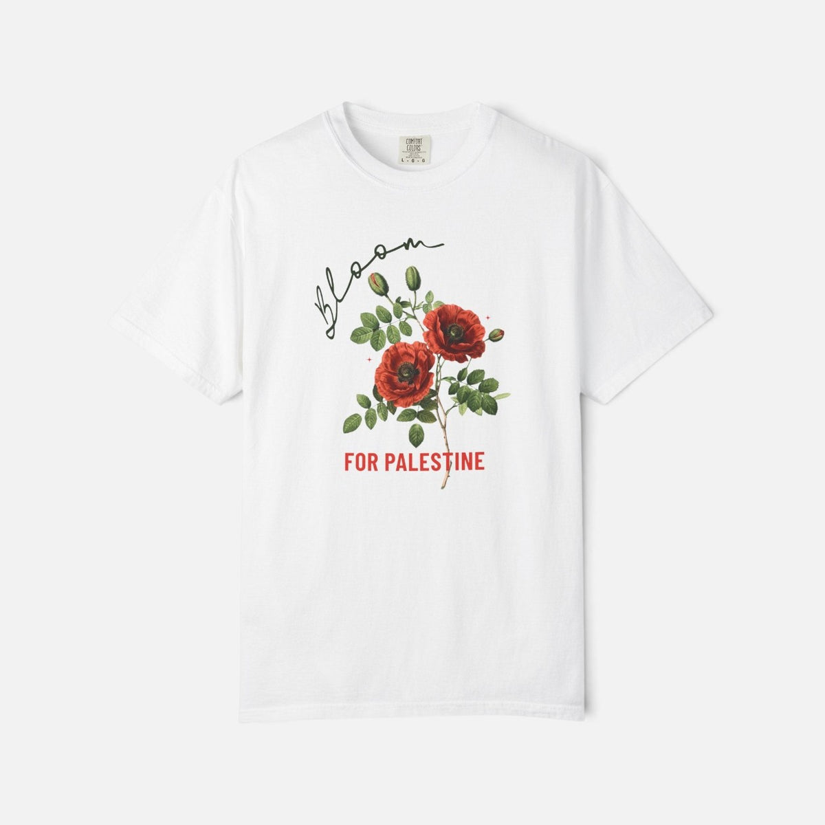 Silenced Roots white Comfort Colors cotton t-shirt featuring a red poppy floral graphic and Bloom for Palestine text.