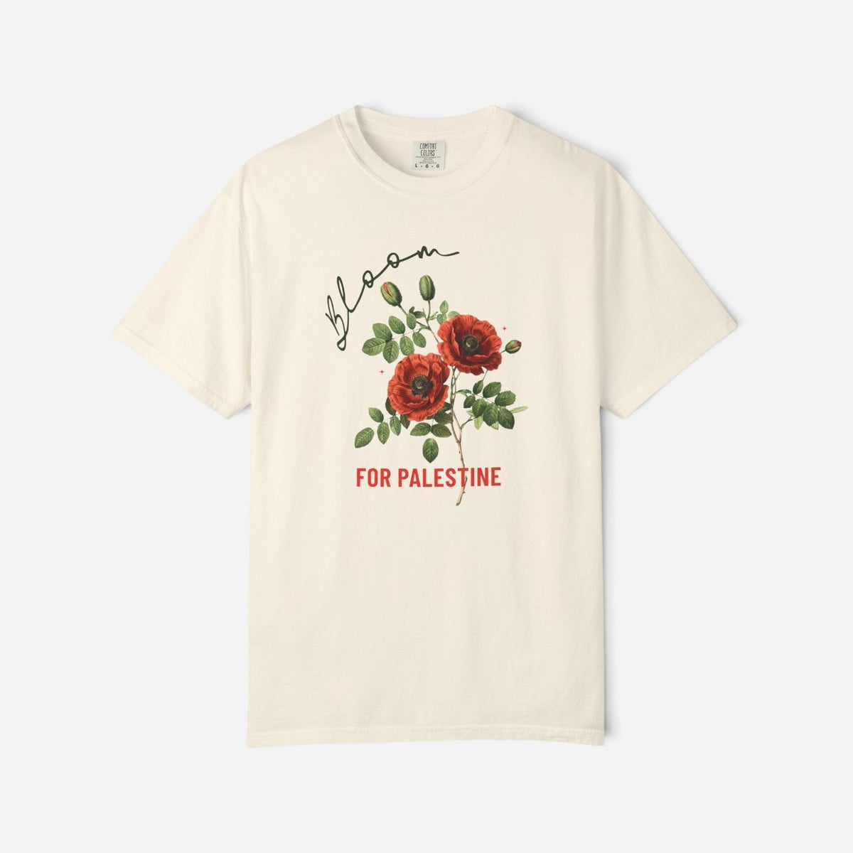 Silenced Roots cream Comfort Colors cotton t-shirt featuring a red floral graphic and Bloom for Palestine text.
