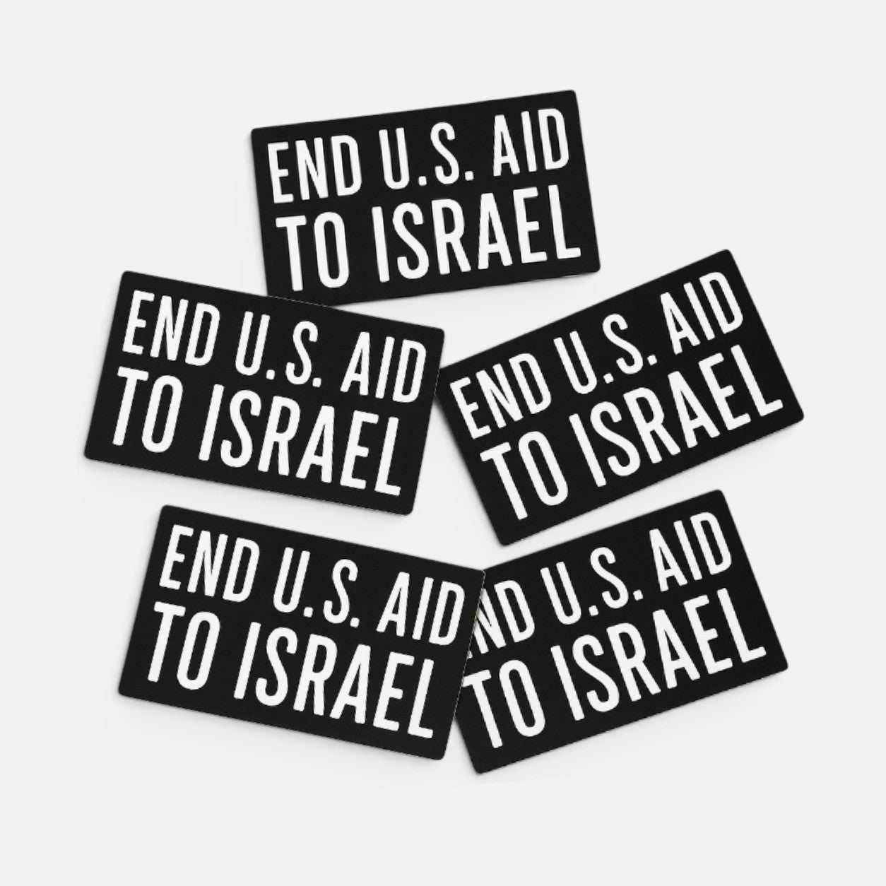 Silenced Roots sticker pack featuring bold white text on black rectangular stickers reading End U.S. Aid to Israel.