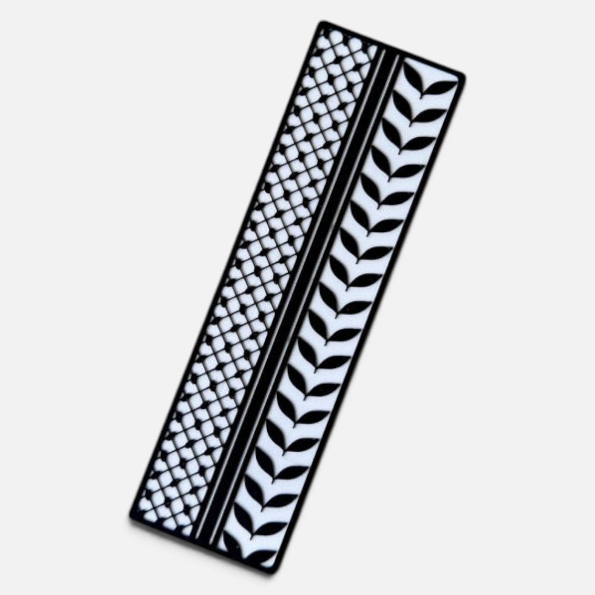 Silenced Roots 3D printed bookmark featuring a black and white keffiyeh pattern and olive branch design with matte finish