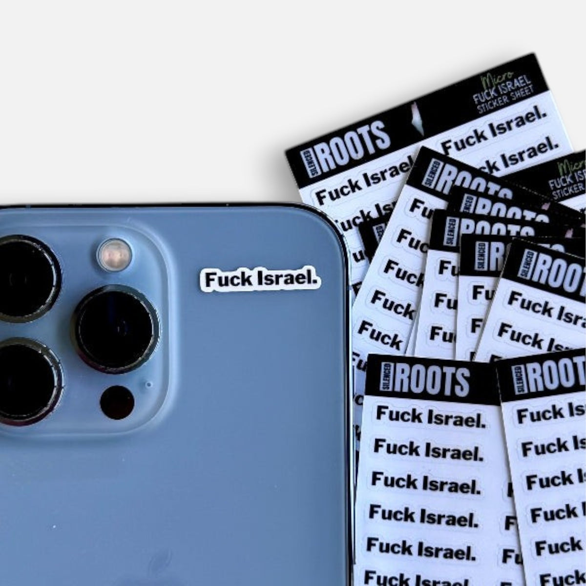 Silenced Roots micro sticker sheet with 14 black and white protest decals applied to a blue smartphone case