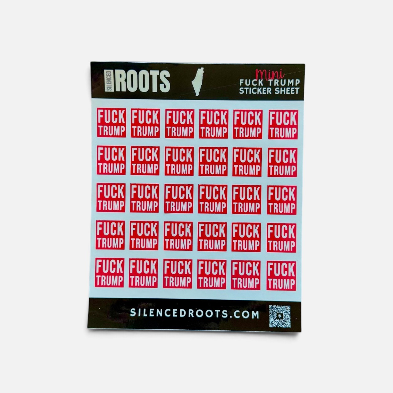 Silenced Roots mini sticker sheet featuring 30 small square red and white political protest stickers on vinyl.